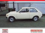 Toyota Starlet 1.0 Special KP60 voor restauratie / zeldzaam, Auto's, Zwart, 4 stoelen, Beige, Origineel Nederlands