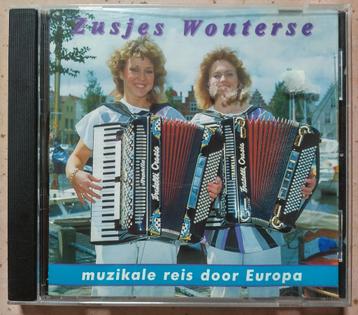 cd Zusjes Wouterse - Muzikale Reis Door Europa 1996 Dart Rec beschikbaar voor biedingen