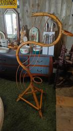 Vintage rotan slang, Ophalen