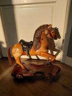 Antiek houten paard, Ophalen