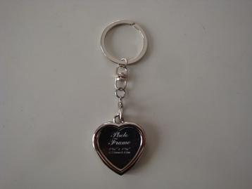 Sleutelhanger met hartvormig fotolijstje zilverkleurig nieuw beschikbaar voor biedingen