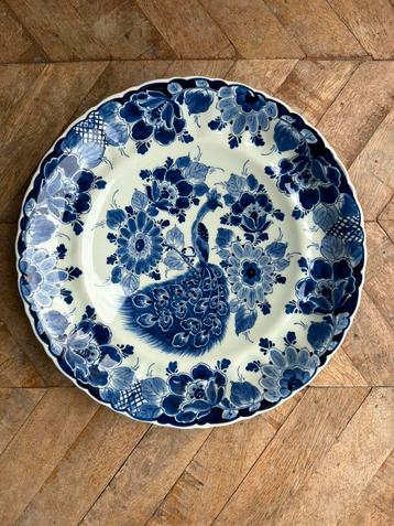Prachtig wandbord Delfts blauw met pauw beschikbaar voor biedingen