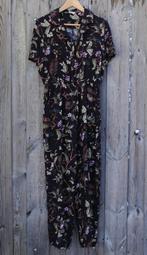 Clockhouse jumpsuit zwart floral maat 36 (valt als m), Kleding | Dames, C&A, Ophalen of Verzenden, Zo goed als nieuw, Maat 36 (S)
