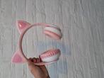 Een roze koptelefoon met lapjes en katten ooren., Ophalen of Verzenden
