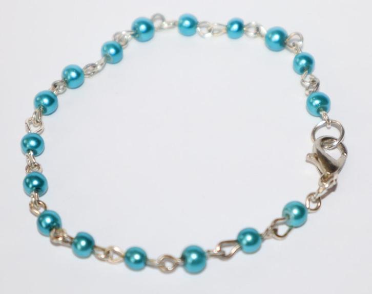 Armband met 4 mm petrolblauwe pareltjes, Sieraden, Tassen en Uiterlijk, Armbanden, Nieuw, Blauw, Ophalen of Verzenden