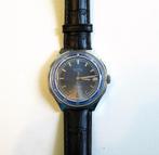 VOSTOK vintage mechanisch horloge met kaleder USSR van de 80, Ophalen of Verzenden, Staal, Overige merken