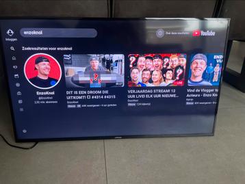Samsung 40 inch smart tv met muurbeugel beschikbaar voor biedingen