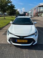 Toyota Corolla TS 1.8 Hybrid 122pk CVT 2021 Wit, Auto's, Toyota, 450 kg, Leder en Stof, Wit, Stationwagon