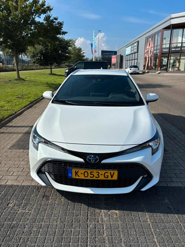 Toyota Corolla TS 1.8 Hybrid 122pk CVT 2021 Wit, Auto's, Toyota, Particulier, ABS, Achteruitrijcamera, Airbags, Airconditioning