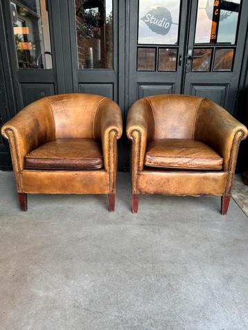 Twee Cognac kleur Leren Clubfauteuils beschikbaar voor biedingen