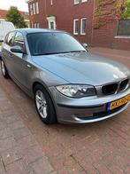 BMW 1-Serie 1.6 116I 5DR 2009 Grijs, Auto's, BMW, 1-Serie, Achterwielaandrijving, 4 cilinders, Leder en Stof