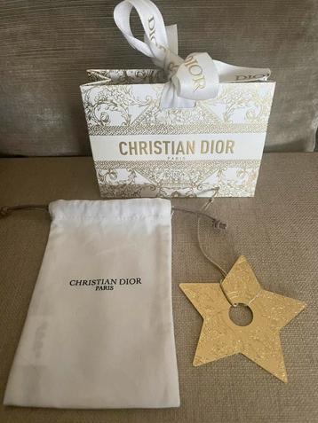 Dior Collectors item, limited edition ster, goudkleurig +tas beschikbaar voor biedingen