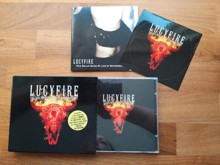 CD Lucyfire - This dollar saved my life at Whitehorse ltd ed, Cd's en Dvd's, Cd's | Hardrock en Metal, Gebruikt, Ophalen of Verzenden