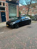 BMW 1-Serie 118i 140pk Aut M-velgen - dealer onderhouden, 65 €/maand, Stof, Zwart, Particulier