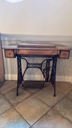 Singer naaimachine tafel, Ophalen