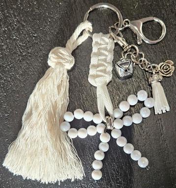 Sleutel- en/of tassenhanger Strik beschikbaar voor biedingen