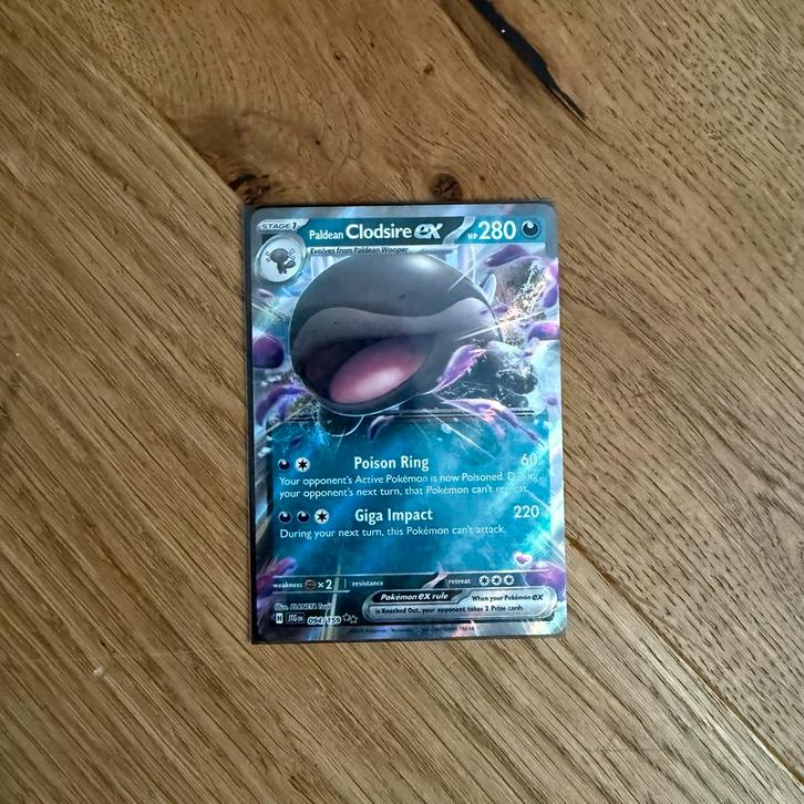 Paldean Clodsire Ex 094/159 - Nieuwstaat!, Hobby en Vrije tijd, Verzamelkaartspellen | Overige, Nieuw, Losse kaart, Ophalen