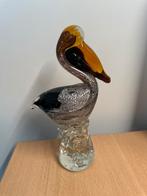 Glazen Pelikaan Sculptuur, Ophalen