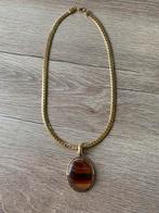 Vintage goudkleurige ketting met bruine steen Jaren 60, Gebruikt, Bruin, Ophalen of Verzenden, Overige materialen