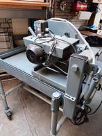 Zaagmachine  voor stenen  en tegels, Ophalen