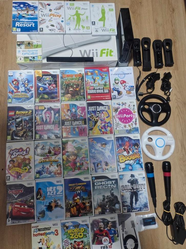 Nintendo Wii met 28 spellen. Just Dance .mario kart, Spelcomputers en Games, Spelcomputers | Nintendo Wii, Gebruikt, Met 2 controllers