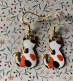 Lapjeskat oorbellen, Ophalen of Verzenden, Nieuw, Overige materialen, Hangers