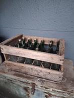 Krat met oude bierflesjes, Ophalen
