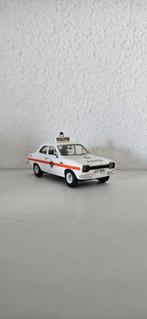 Ford Escort  politie, Hobby en Vrije tijd, Modelauto's | 1:43, Ophalen of Verzenden, Zo goed als nieuw, Auto, Overige merken