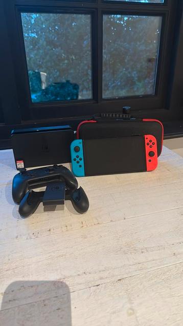 Nintendo switch OLED + pro controller en super smash bros