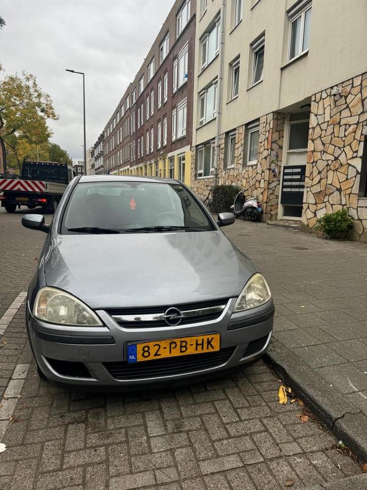 Opel Corsa 1.2 16V 5D 2004 Grijs, Auto's, Opel, Particulier, Corsa, Benzine, C, Hatchback, Handgeschakeld, Origineel Nederlands