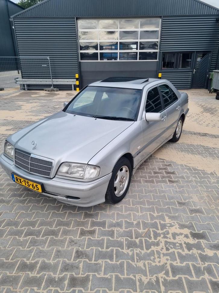 Mercedes-Benz C-Klasse 1.8 C180 Sedan Classic 1997 Grijs, Auto's, Mercedes-Benz, Bedrijf, Te koop, C-Klasse, Benzine, Sedan, Handgeschakeld