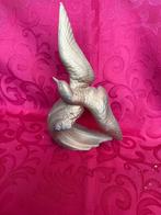 Bronzen vogel, Ophalen