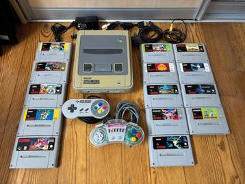 Goedwerkende Super Nintendo met 14 games en controllers beschikbaar voor biedingen