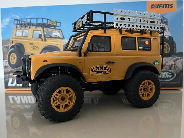RC Land Rover Defender CAMEL TROPHY, Hobby en Vrije tijd, Modelbouw | Radiografisch | Auto's, Zo goed als nieuw, Auto offroad