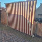 Elektrisch knikarm zonnescherm rood/wit gestreept, Ophalen