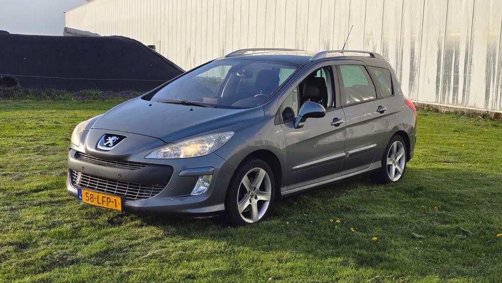 Peugeot 308 1.6 THP 110KW SW 7P 2010 Grijs / NWE APK / NAP /, Auto's, Euro 5, Stof, Zwart, 4 cilinders