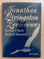 Jonathan Livingston Zeemeeuw - Richard Bach en Russel Munson, Gelezen, Ophalen of Verzenden, Richard Bach, Spiritualiteit algemeen