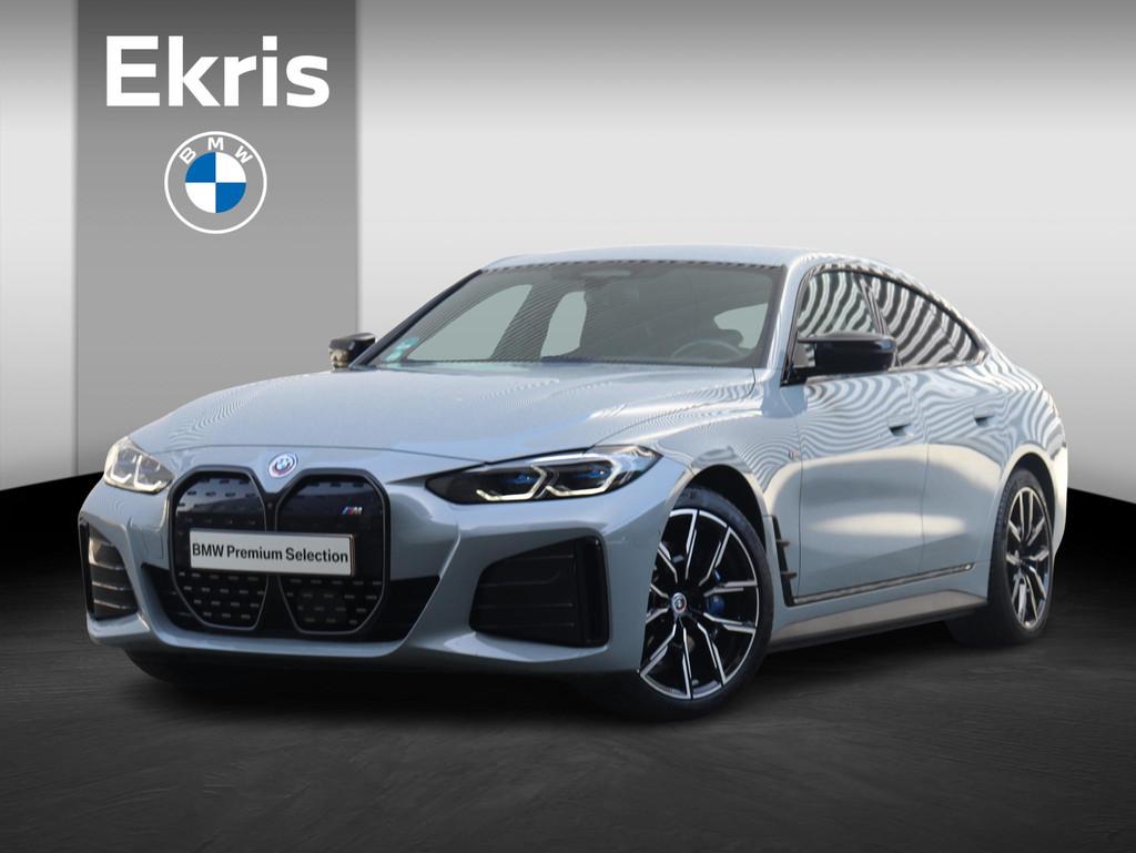 BMW i4 M50 | High Executive | M Sportpakket | Driving Assist, Auto's, BMW, Stof, 520 km, 4x4, Origineel Nederlands