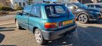 Toyota Starlet 1.3 XLi, Auto's, Stof, Zwart, 4 cilinders, Origineel Nederlands