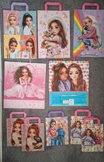 Te koop 11 z.g.a.n papieren Topmodels tassen, Ophalen of Verzenden, Zo goed als nieuw, Knutselen
