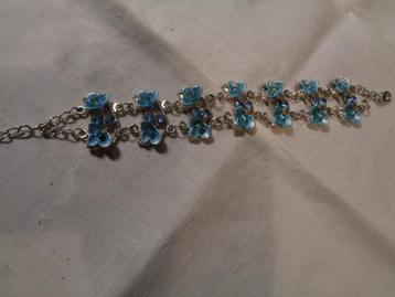 met blauwe bloemen met kristal steentjes nr arm 11 beschikbaar voor biedingen