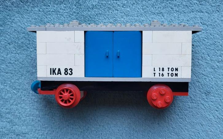 Lego trein 4,5 & 12 Volt blauwe rails goederen wagon., Kinderen en Baby's, Speelgoed | Duplo en Lego, Gebruikt, Lego, Complete set