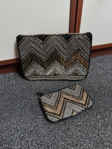 Zwarte clutch tas met zilver en gouden kraaltjes beschikbaar voor biedingen