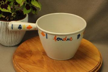 Le creusert fondue pan beschikbaar voor biedingen