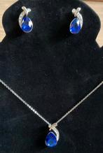 Sieradensetje, zilverkleur, strass en blauwe steen. Nieuw!!, Nieuw, Ophalen of Verzenden, Zilver, Overige materialen