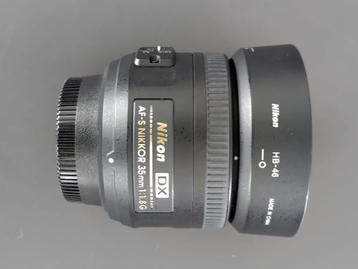 Nikon DX AF-S Nikkor 35mm 1:1.8G + Nikkor 18-70 1:3.5 - 4.5  beschikbaar voor biedingen