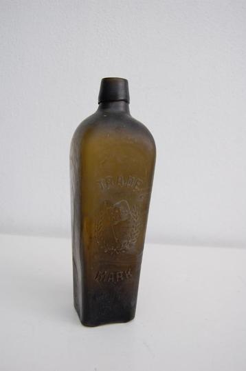 19e eeuwse glazen Jenever Fles Kelderfles African Trading Co beschikbaar voor biedingen