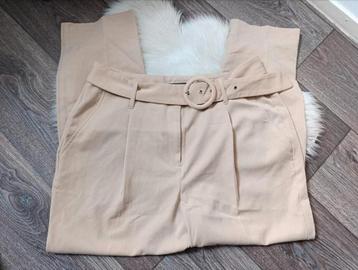 Beige broek maat 44 beschikbaar voor biedingen