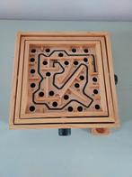 Houten doolhof spel, Ophalen