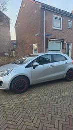 Kia Rio 1.2 I 5DRS 2012 Grijs, Auto's, Kia, 40 €/maand, Zwart, 4 cilinders, Handgeschakeld